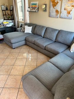 The MOST COMFORTABLE Couch ever. Grey sectional from Jerome’s