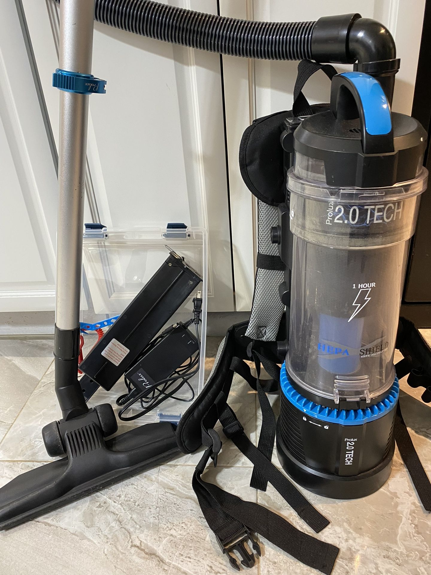 PROLUX Cordless Vacuum Cleaner with 2 Batteries & Charger- brand new used once. $500.00