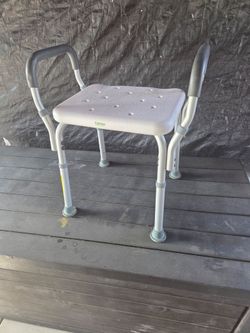 Shower chair with arms