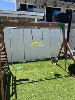 Backyard Kids Outdoor Wooden Swing Set with Wave Slide, Swings, and Climbing Rock Wall Ladder