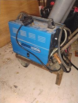 220 Amp Dual Mig Welder With Roll Of Wire