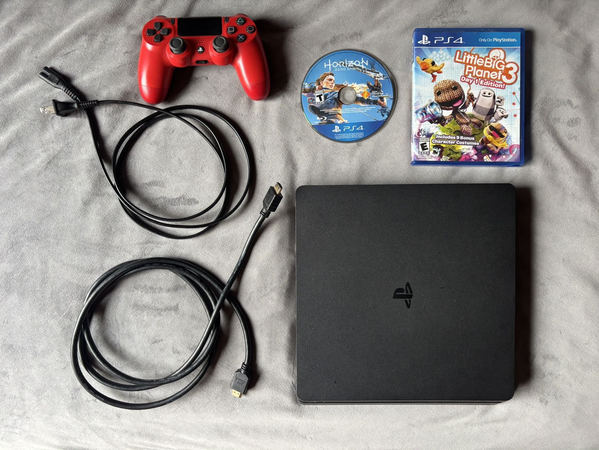 PS4 Slim (with Controller, & 2 Games)