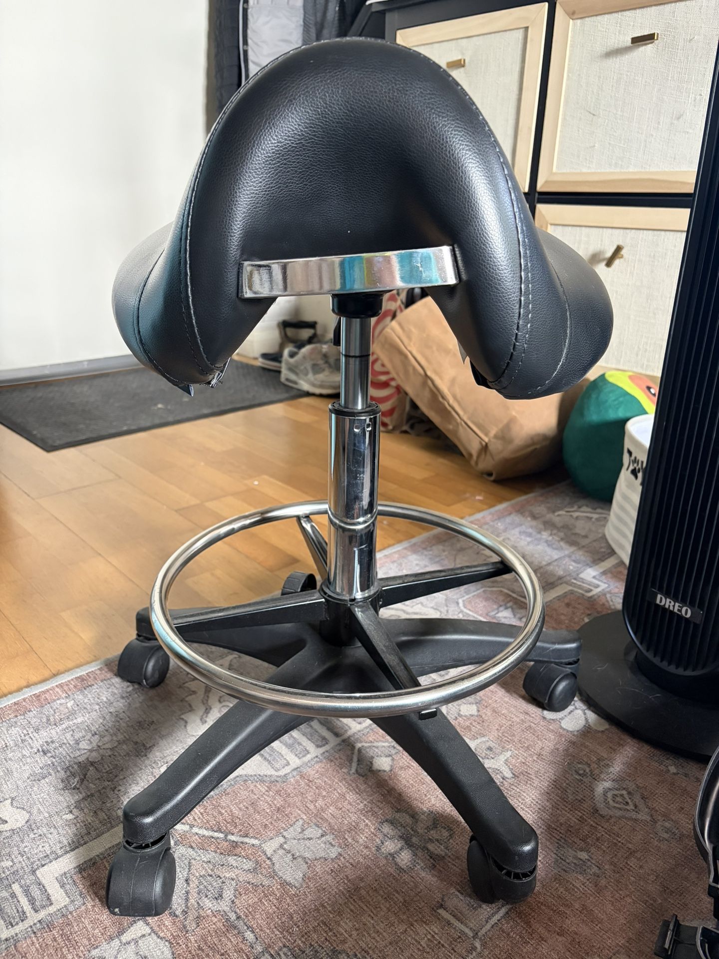 Black Rolling Saddle Seat Chair – Good Condition