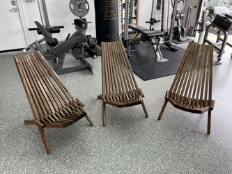 3 Matching wooden campfire foldable chairs, all in good used condition.  Just washed.  Price for all 3 together only.