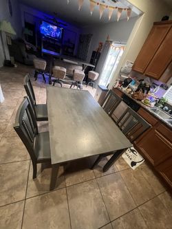 Used Table And 4 Chairs 