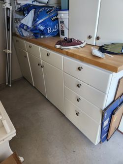 Butcher block countertop and kitchen cabinets