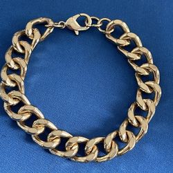 Men’s stainless steel gold color 8 1/2” heavy bracelet. Pick Up in Jupiter.