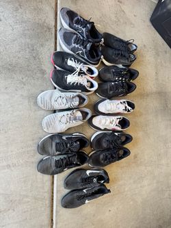 9 pairs of Nike workout and regular shoes