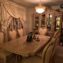 Good condition dining room table with 8 chairs and china buffet all for $1500