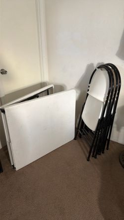 Moving Sale - 6 Foot Folding Table with 4 Folding Chairs