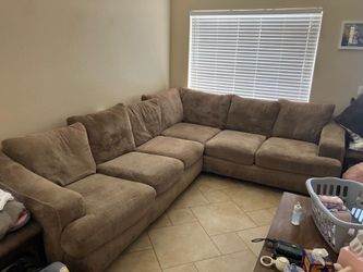 Brown “L” couch