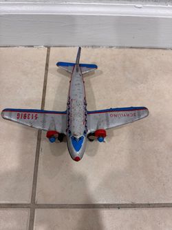 Attention collectors Vintage Schylling tin DC toy airplane, friction mtor turning propellers