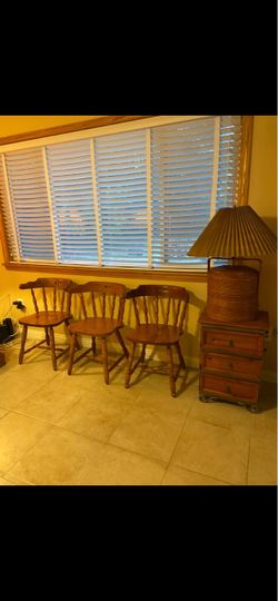 Three real wood spindle chairs, maple