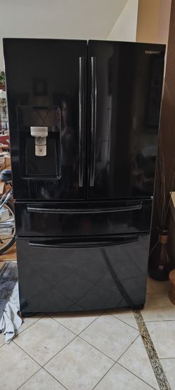 Samsung gloss black French 4 door refrigerator with water and ice in door standard depth