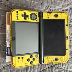 Nintendo 3ds XL With Pikachu Stickers And Case. Used Like New. Includes Pokemon Sun And Moon Games And Pikachu Game Holder 
