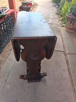 Antique walnut drop leaf table