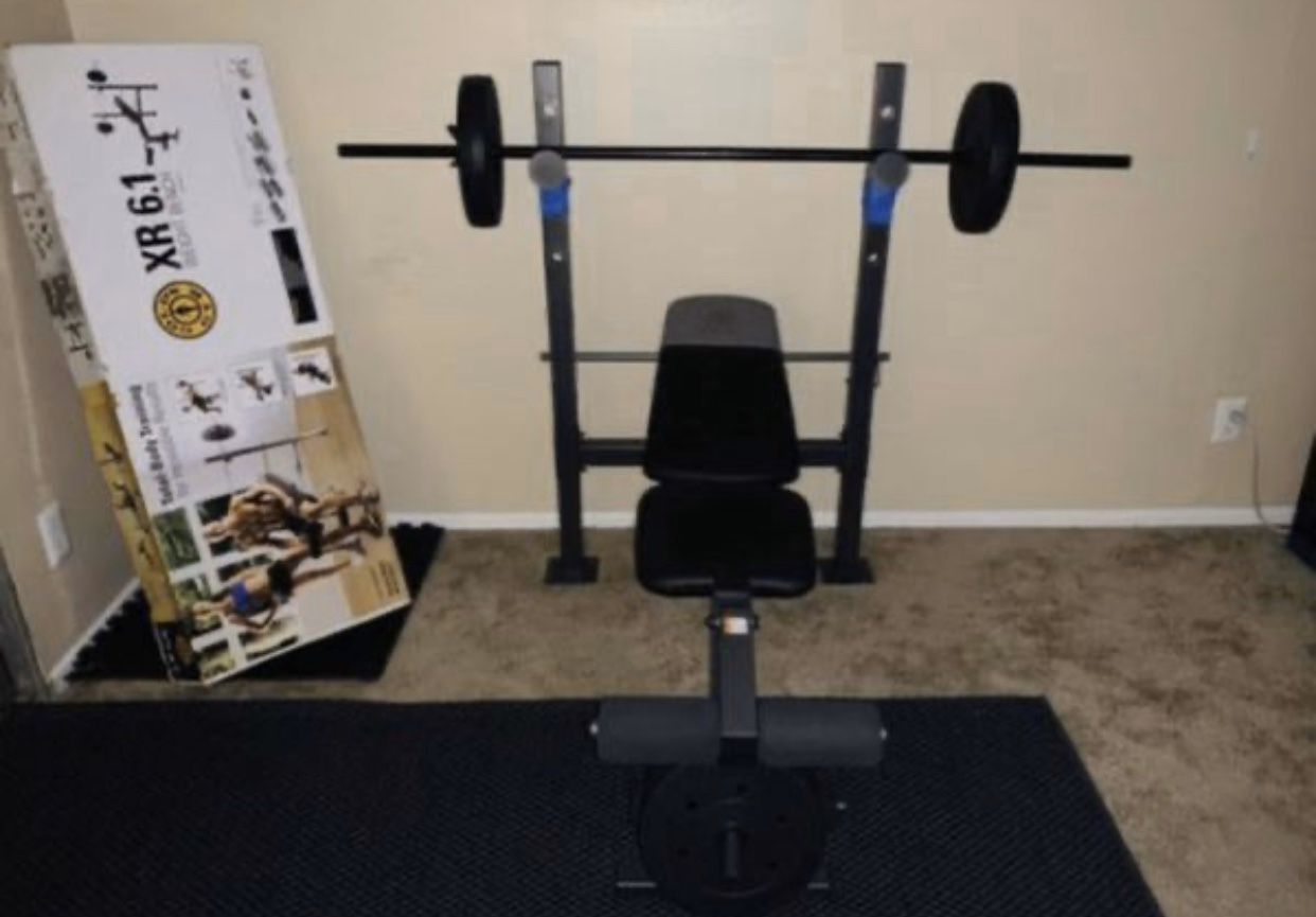 Gold Gym Bench and Bar set with weighted plates 100lbs(10s,15s,25s)