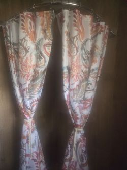 Brand new set of 2 shower curtains,  liners and hooks all included $15