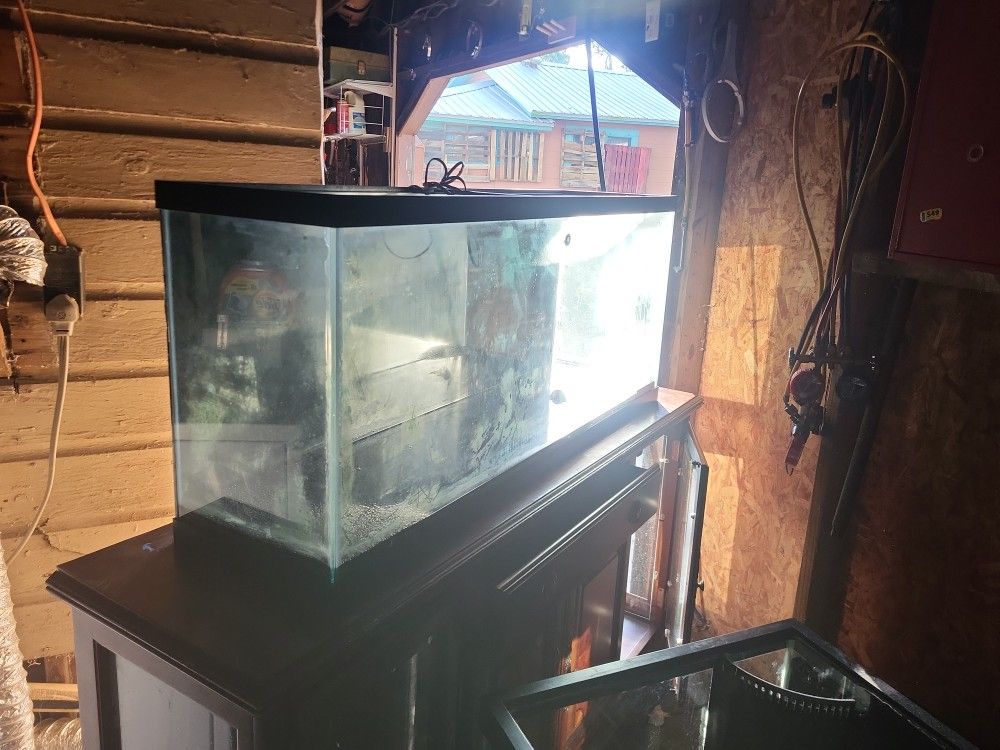 75 Gallon Tank And Stand.100.00