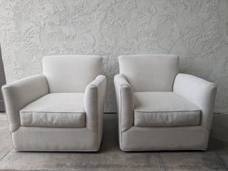 Swivel arm chairs