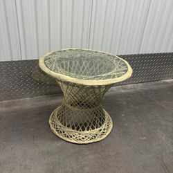 Outdoor glass top side table… 21” round ,16” high $35
