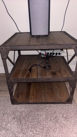 Wooden side table with metal trim