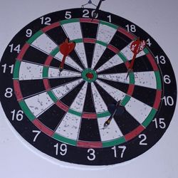 Dart Board With 4 Darts