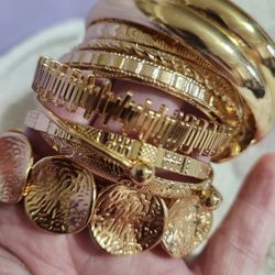 New Adjustable Bangle Bracelets.  Gold Toned...not 925