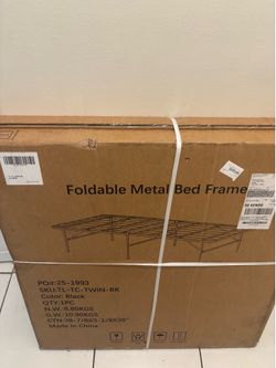 Two Foldable metal bed frames.