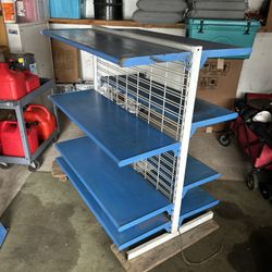Double sided Shelf Unit. With Nine Shelves.
