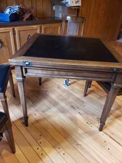 Expandable Table And 4 Chairs 