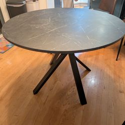 Round IKEA black table