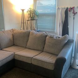 Couch, Entertainment Center, Tv And Light And  Stand