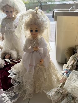 Beautiful collection of three Victorian-style porcelain dolls