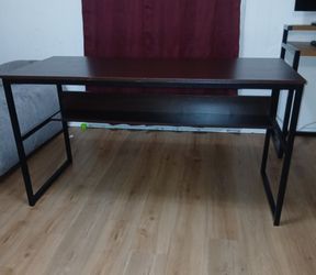 Wooden coffee desk. Large, 30 inch  high and 55 inch  long.