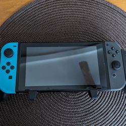 Nintendo Switch With Grip And Charger