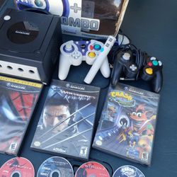 Nintendo GameCube with 5 Adult Kids Games. 2 Controllers. 1 Mic. 1 Racing Kitt game cube Console. $300! Lowest I accept Cash & trade. Free Delivery in