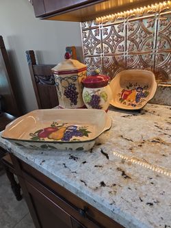 Grape canisters and 2 platters
