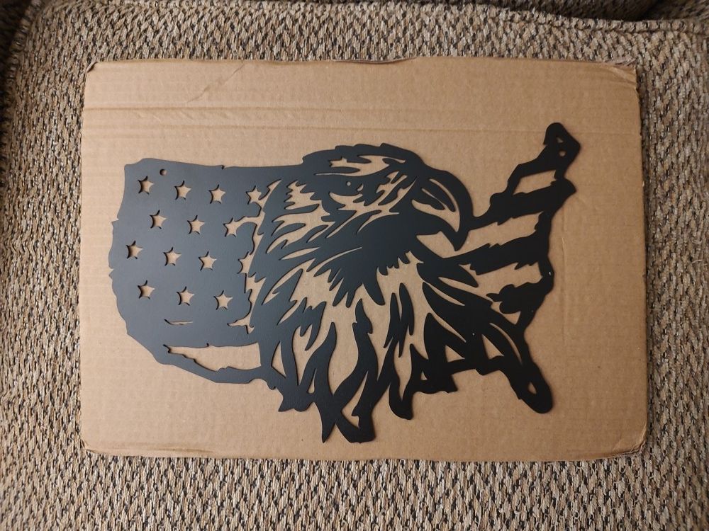 LASER CUT BLACK METAL SIGN.  12" X 7".  NEW.  PICKUP ONLY