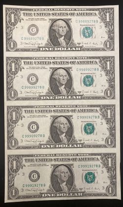 UNCUT SHEET OF FOUR ONE DOLLAR BILLS IN UNCIRCULATED CONDITION