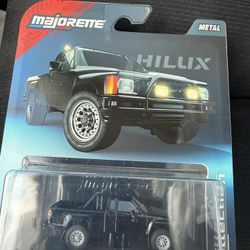 Toy Toyota Hilux SR5 Pickup Truck 1985 Black 1:64 Diecast Model Collectible Vehicle