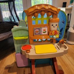Fisher-Price Laugh & Learn Grow-the-Fun Garden to Kitchen, Interactive Farm-to-Kitchen Playset for Toddlers with Music, Lights and Learning Content