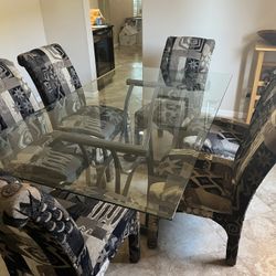 Glass And Metal Table With 8 Chairs