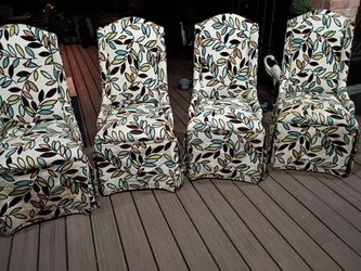 Custom design chairs asking $50 for all four has a little Nick hole on each arm but can't really see it l asking 60 for all four