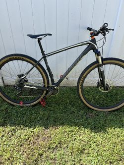 Specialized Carbon fiber mountain bike frame, upgraded handlebars, crank, and carbon fiber rims.. This bike is size large. Over $2000 and upgrades.