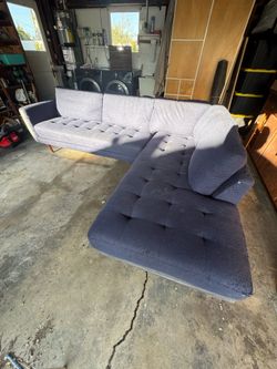 Navy blue living spaces sofa