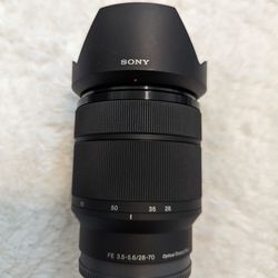 Sony FE 3.5-5.6/ 28-70 OSS ZOOM Camera Lens Cap + Hood - EXCELLENT
