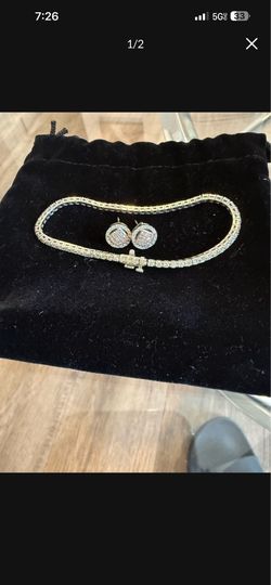 Pulsera y aretes de oro