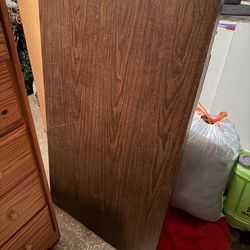 FOLDING TABLE  45 1/2"w x 27"deep; heavy; 2 cushions on the feet need to be replaced; cross  streets are Arapaho & Waterview