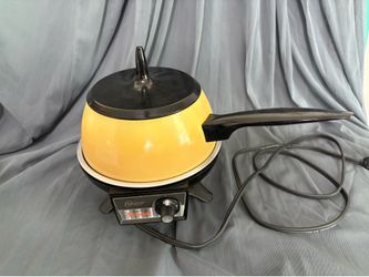 Working vintage fondue set